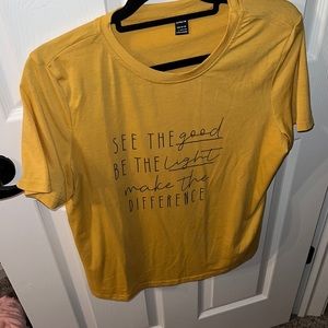 Large yellow graphic tee